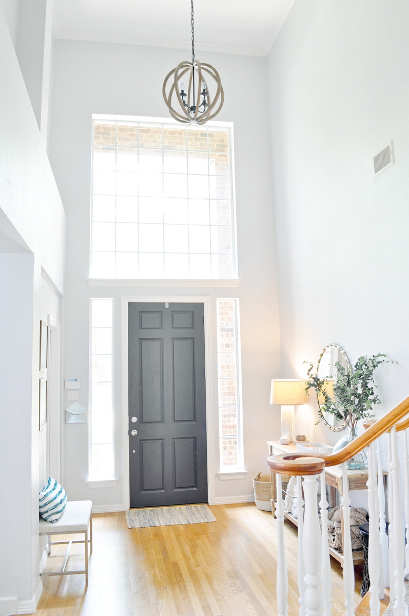 See how we updated our entryway on a budget with paint and a few key furniture pieces!