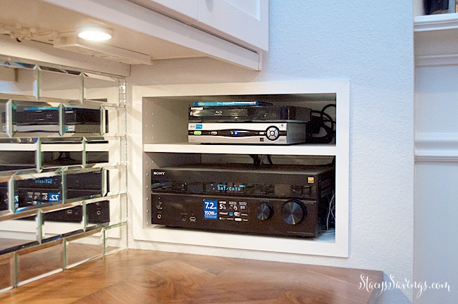 Using an IKEA Sektion kitchen cabinet to make a custom media cabinet in our living room built in bar.