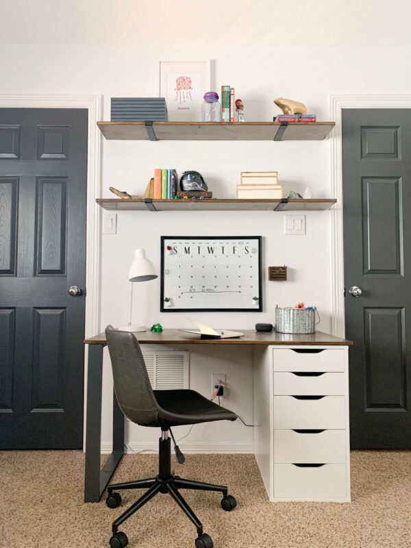 It's the Reveal of our One Room Challenge! This tween boy space has come a long way! Come see all of the before & after photos! A tween boy space with a new DIY desk!