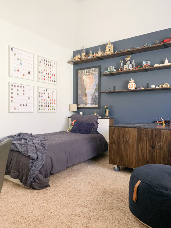 It's the Reveal of our One Room Challenge! This tween boy space has come a long way! Come see all of the before & after photos! A tween boy space with all of his favorite things including minifig frames!