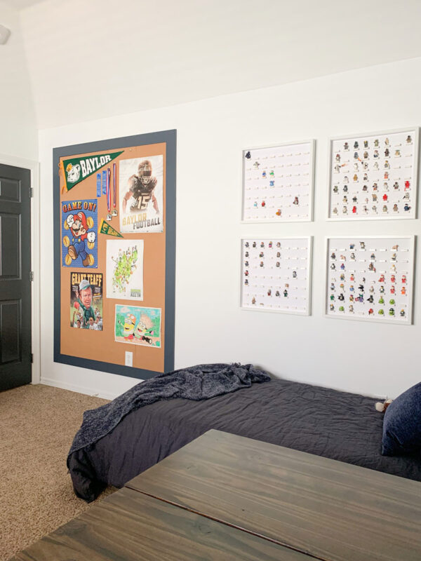 It's the Reveal of our One Room Challenge! This tween boy space has come a long way! Come see all of the before & after photos! A tween boy space with all of his favorite things including a bulletin board & more!