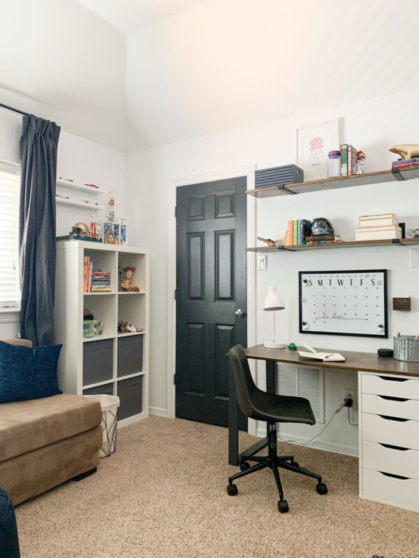 It's the Reveal of our One Room Challenge! This tween boy space has come a long way! Come see all of the before & after photos! A tween boy space with storage for all of his toys & a desk!