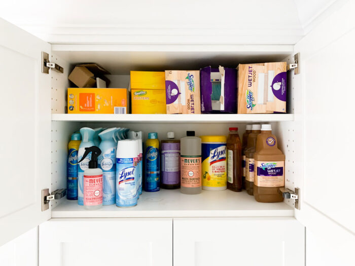 Cleaning supplies backstock organization in our laundry room