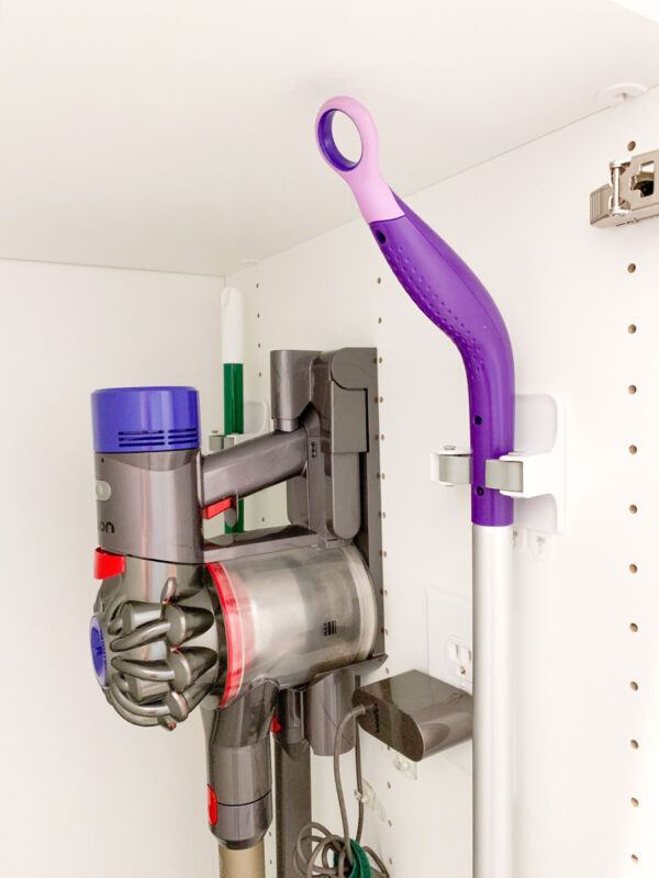 Command Broom Holders in our Tall Utility Cabinet