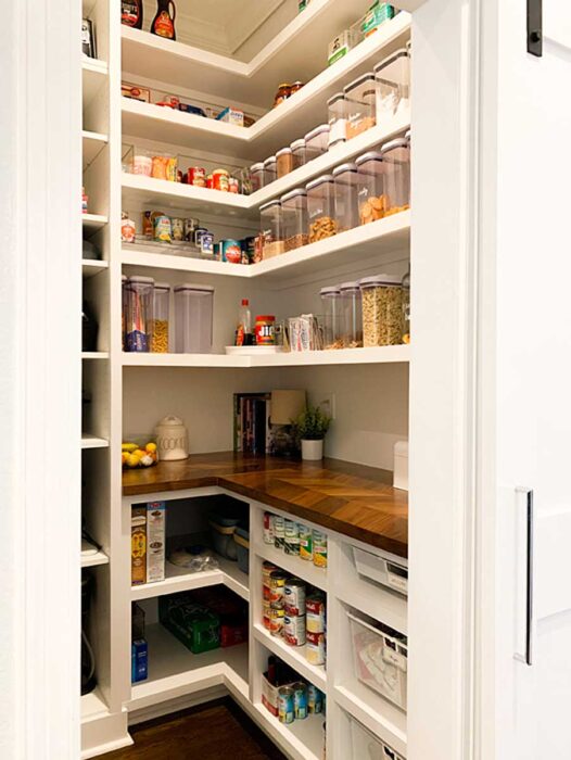 How I Organize My Walk-In Farmhouse Pantry full view from kitchen.