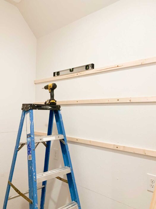 It's the Pantry Reveal! Check out how we designed and built a new walk-in butler's pantry complete with lots of shelving and a countertop!