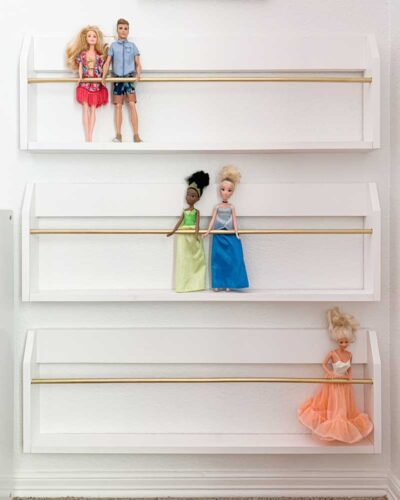Save Barbie's hair and learn to make these easy DIY Barbie Doll Organization Wall Racks!