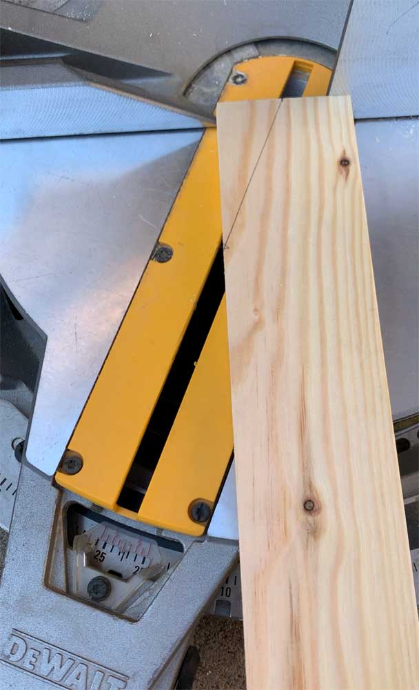 Cutting the front angle pieces for our Anthropologie-Inspired magazine racks. We're going to organize Barbie dolls!